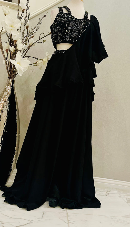 Contemporary yet stunning Palazzo set with crop-top. Top is intricately embellished with embroidered cutdana beads. Elephant bottom georgette palazzo gives this look an extra flair. Paired with a ruffled stole dupatta.

Size available: 38 with 4inch margin