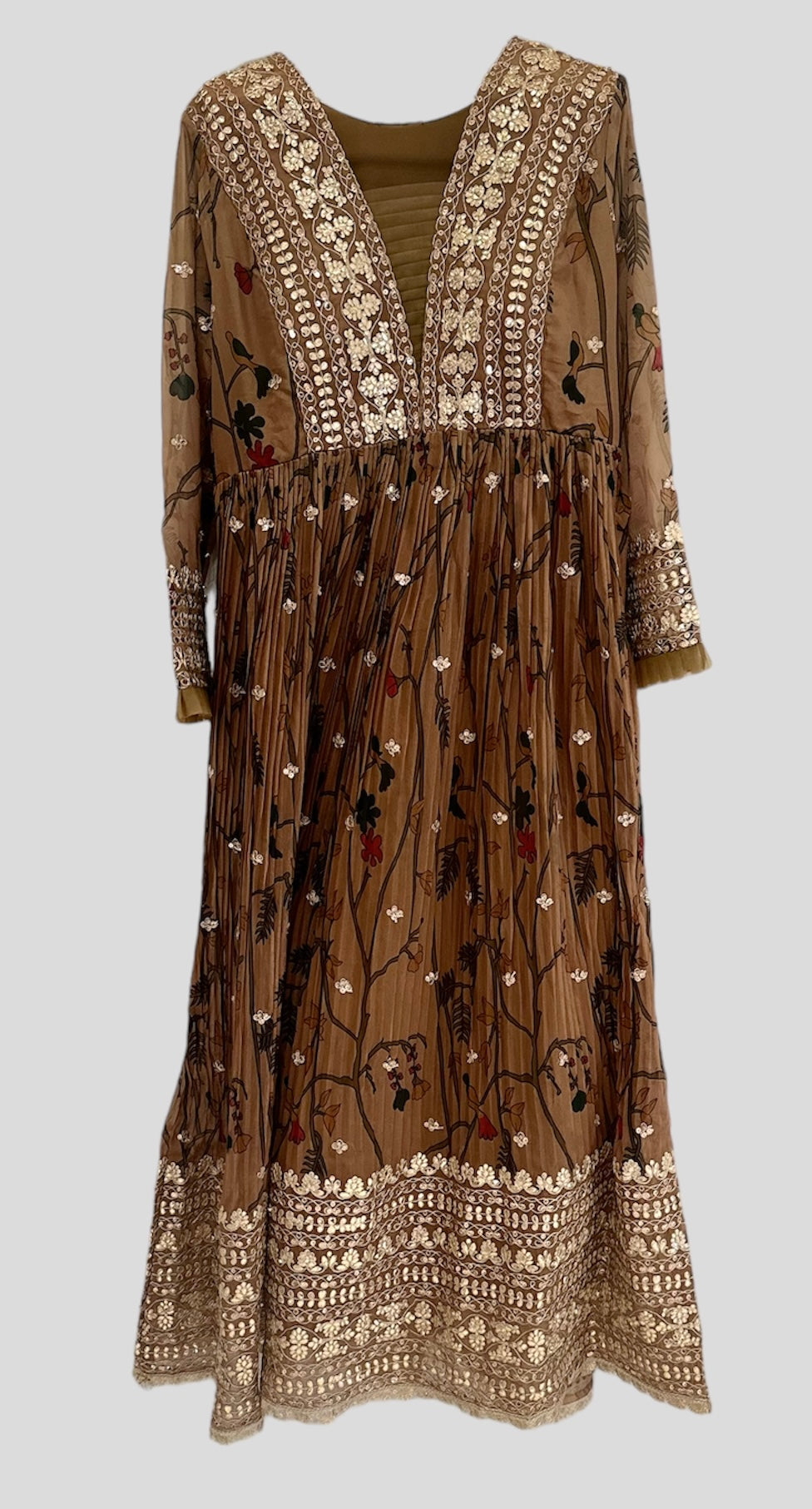 Beautiful rustic gown floral gown crafted in organza silk. Embellished with heavy gota patti, sequins, and embroidery. 


Size available 43 with 3 inch extra margin (1.5in each). 