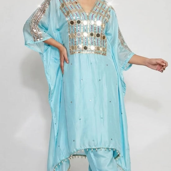 Light blue Kaftan set combines the timeless shimmer of hand-crafted mirror work, delicate beadwork, and sequins